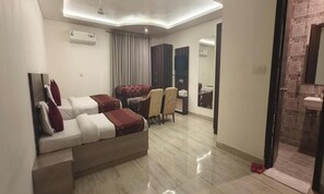 Family Studio Suite, Balcony | Laptop workspace, free WiFi, bed sheets - Hotel Lakshmi Palace (New Delhi)