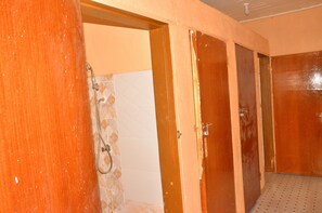 Shared Dormitory | Bathroom | Free toiletries, slippers, towels, soap - Bunyonyi Safaris Resort (Kabale)