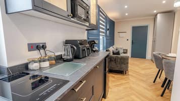 Fridge, microwave, coffee/tea maker, toaster