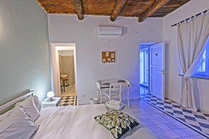 Double Room, Garden View | Desk, laptop workspace, blackout drapes, iron/ironing board - VERDELIA (Curti)