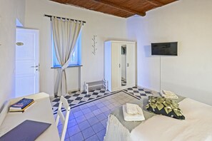 Double Room, Garden View | Desk, laptop workspace, blackout drapes, iron/ironing board - VERDELIA (Curti)