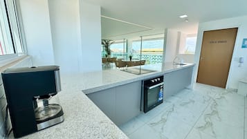 Fridge, microwave, coffee/tea maker, blender