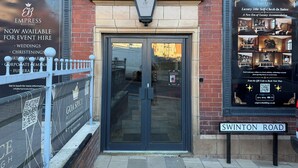 The entrance to the Empress Building with a sign indicating it is available for event hire. - Empress Building (Mexborough)