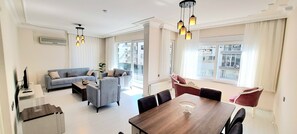 Grand Apartment, 3 Bedrooms, 2 Bathrooms, Sea View | Living area - Gurcuoglu Homes (Antalya)