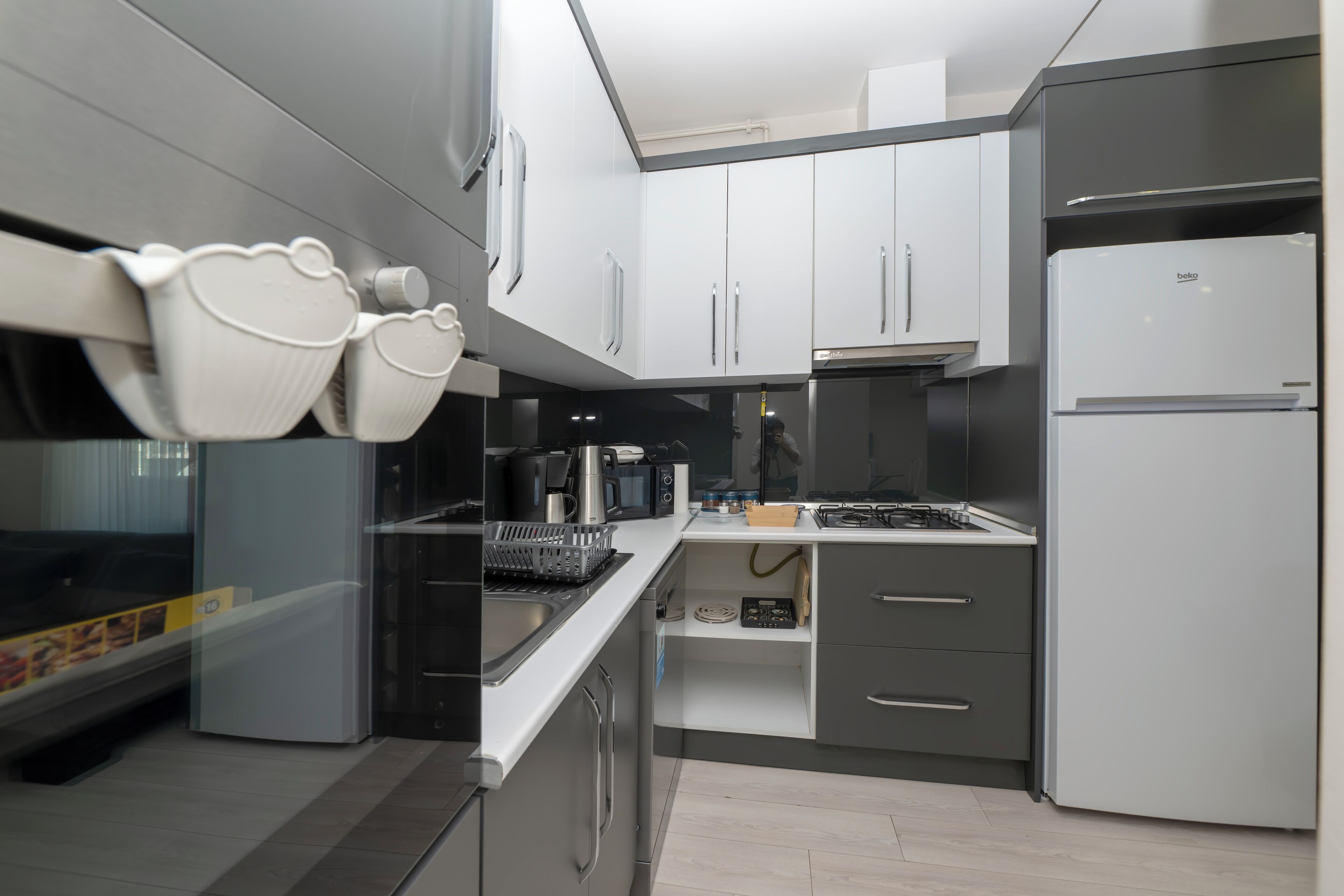 Departamento Deluxe, 2 habitaciones, Terraza | Cocina privada | Refrigerador, microondas, horno y parrilla de estufa 