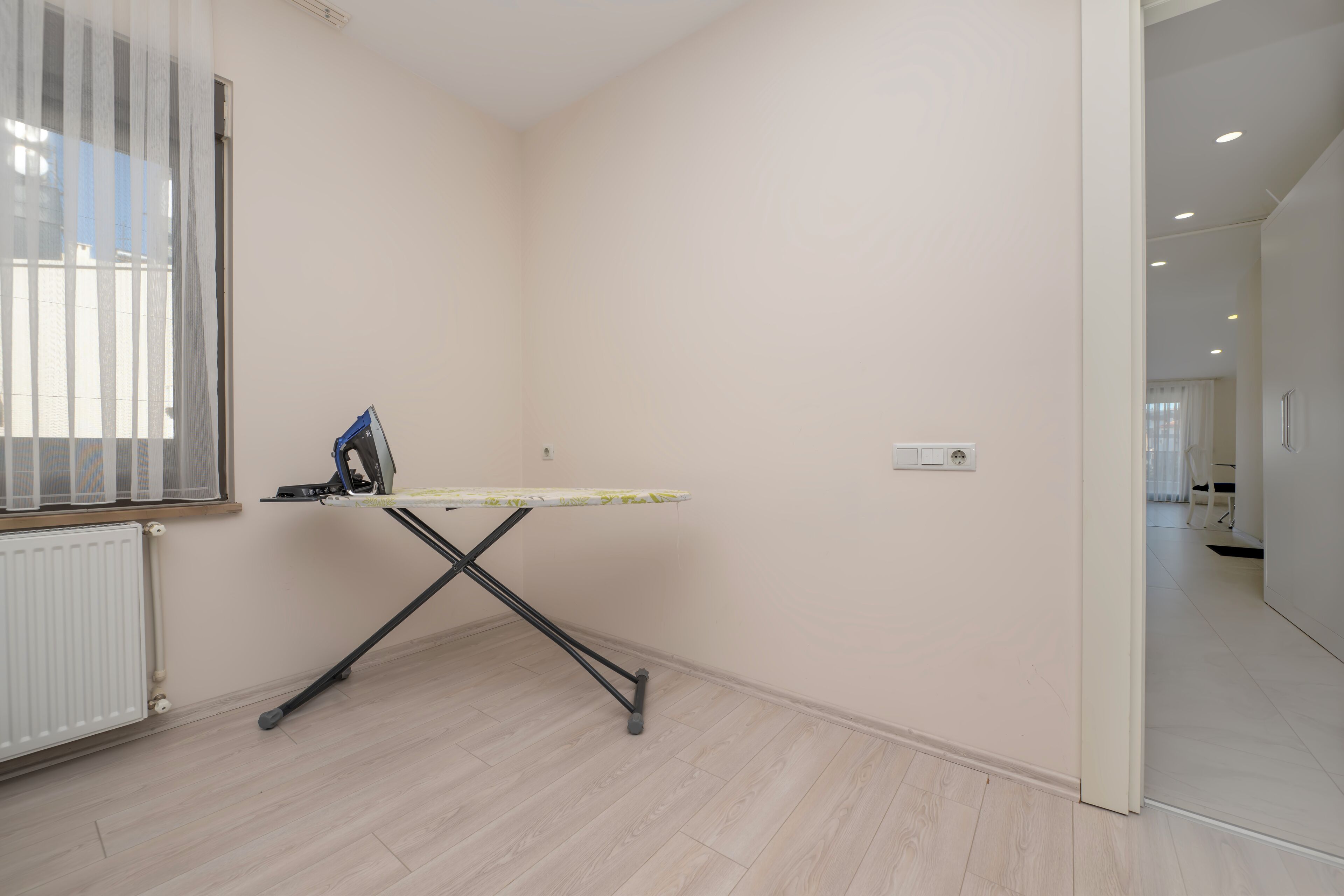 Desk, laptop workspace, blackout drapes, soundproofing