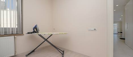 Desk, laptop workspace, blackout drapes, soundproofing