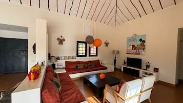 Deluxe Villa, Smoking, Pool View | Living area