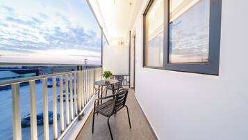 Deluxe Single Room, City View | Terrace/patio