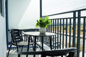 Quarto solteiro luxo, vista para a cidade | Terraço/pátio