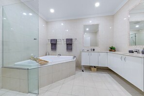 Shower, jetted tub, hair dryer, towels