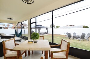 Outdoor dining - The Port Haven~ A Spacious 4/3 with Fenced in Yard & Game Room (Port St. Lucie)