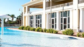 A swimming pool with a clear blue water surface, surrounded by a brick walkway. - Ariel Dunes I 1906 *3 pools *Beach access* (Miramar Beach)