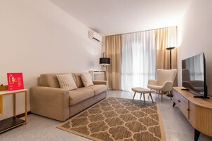 Appartamento Basic | Area soggiorno | TV 35 cm con canali digitali