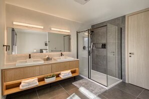 Shower, hair dryer, towels, soap - NEW! Luxury Condo Ostrya Next to Tremblant Village (Mont-Tremblant)