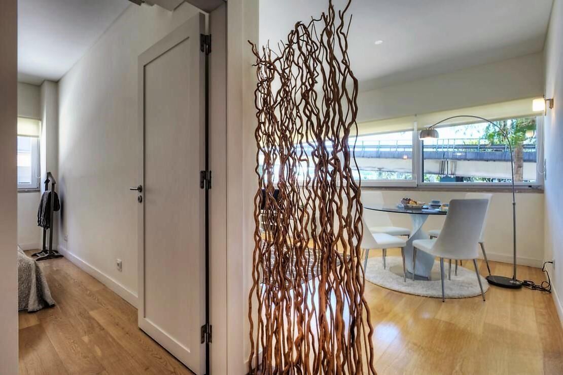 Deluxe Apartment | Living area | 31-inch TV with cable channels