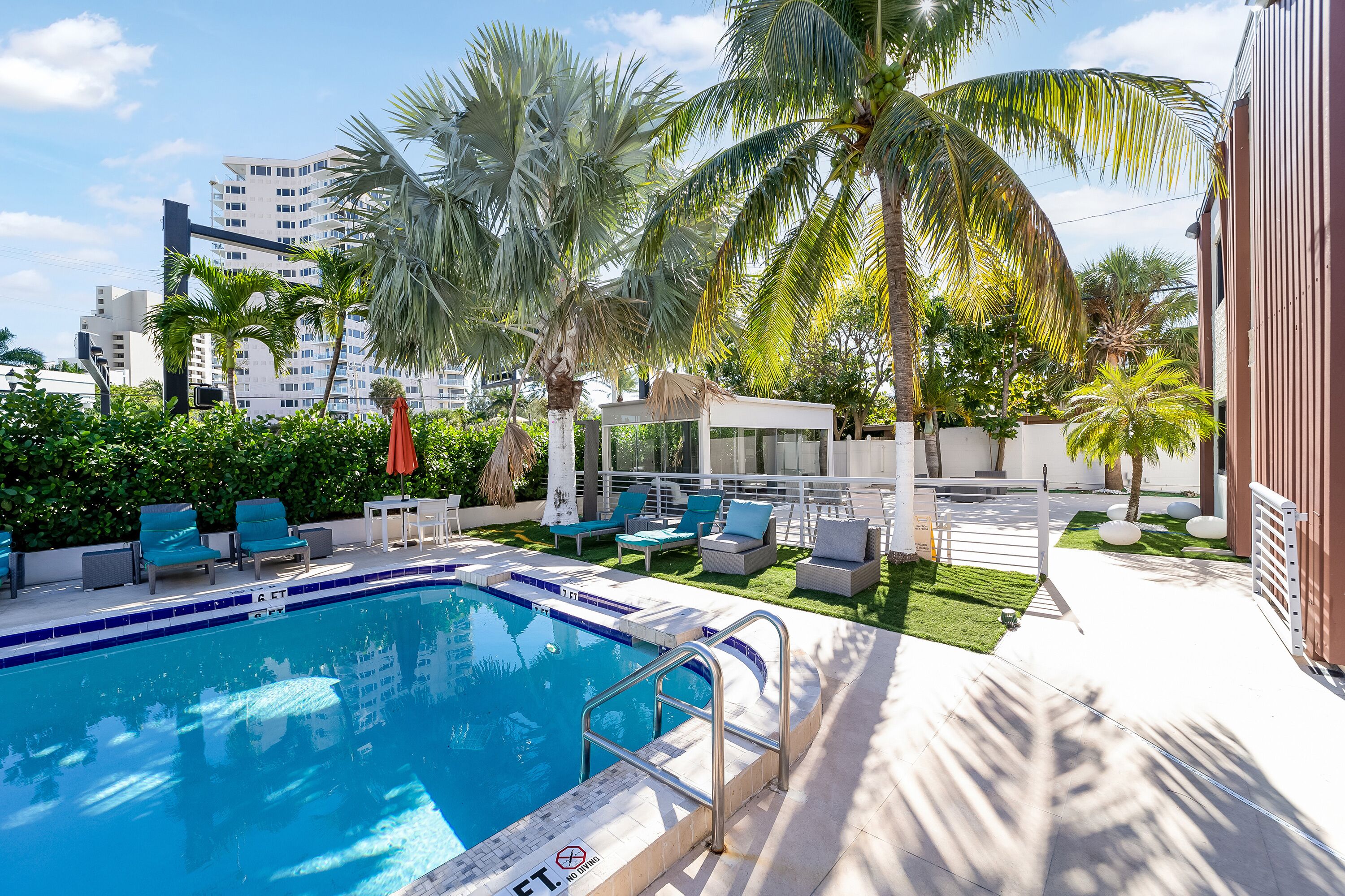 2 outdoor pools, open 8:00 AM to 7:00 PM, pool umbrellas, sun loungers