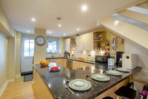 Oven, cookware/dishes/utensils