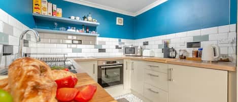 Microwave, oven, cookware/dishes/utensils