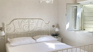 2 chambres, fer et planche à repasser, lit parapluie, Wi-Fi gratuit