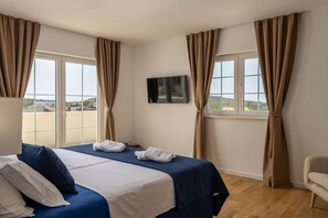 Desk, iron/ironing board, travel cot, free WiFi