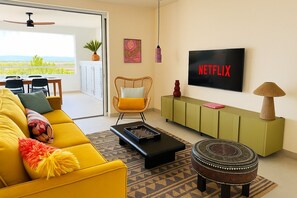 Living area - 2 bedroom apt at blue bay resort / 5 min walk from beach / pool / private patio (Willemstad)
