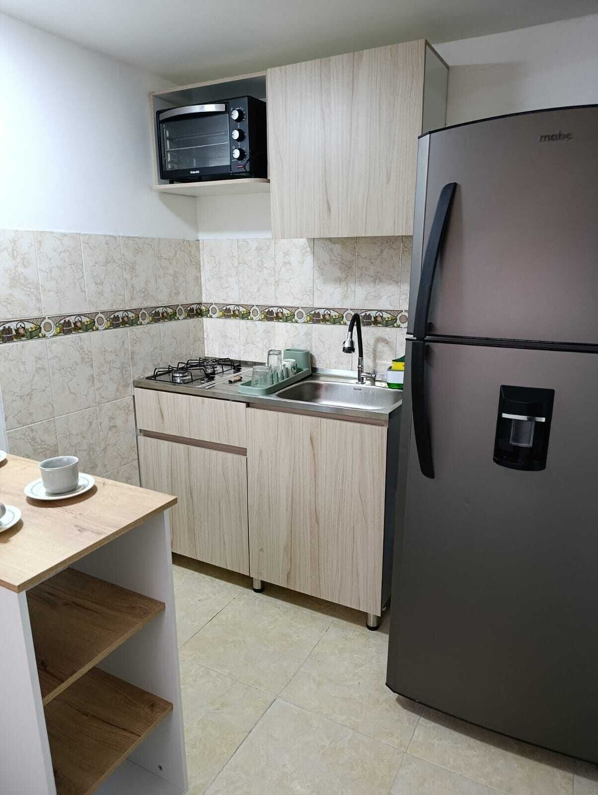 Family Apartment | Private kitchen | Full-size fridge, oven, stovetop, highchair