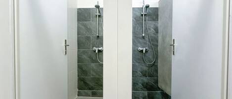 Shower, towels, soap, toilet paper