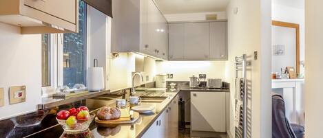 Microwave, oven, high chair, cookware/dishes/utensils