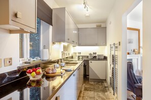 Microwave, oven, highchair, cookware/dishes/utensils