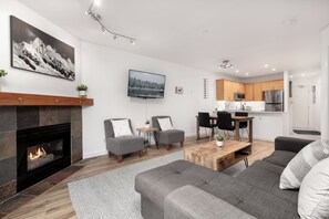 TV, fireplace - The Storm Shack - Central, Bright Village 1.5 Bdrm (Whistler)