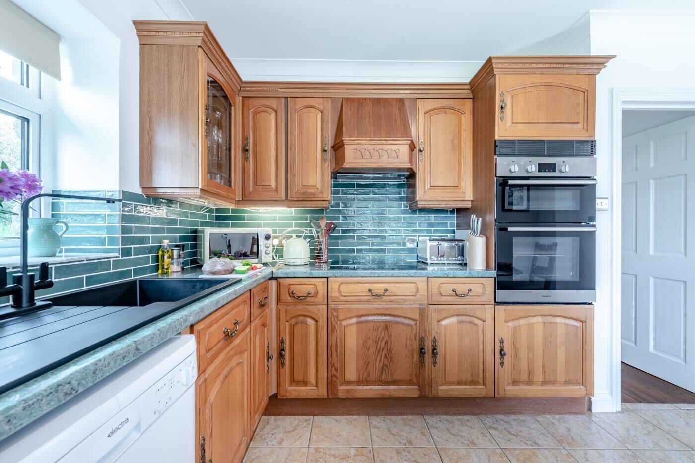 Oven, dishwasher, high chair, cookware/dishes/utensils