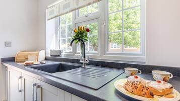 Microwave, oven, cookware/dishes/utensils