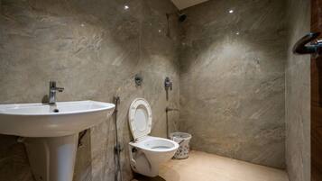 Shower, slippers, towels, soap