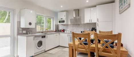 Oven, high chair, cookware/dishes/utensils