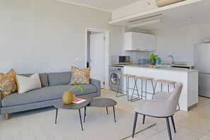 TV, offices - Modern 1-Bed V&A Waterfront | Canal & Harbor Views (Cape Town)