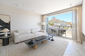 TV, offices - Elegant One Bed | Sea Point | Mountain Views (Cape Town)