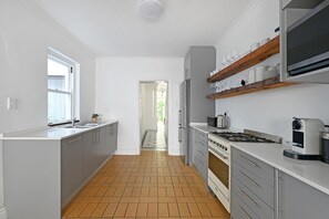 Fridge, microwave, oven, stovetop - Elegant Three Bedroom Home (Cape Town)