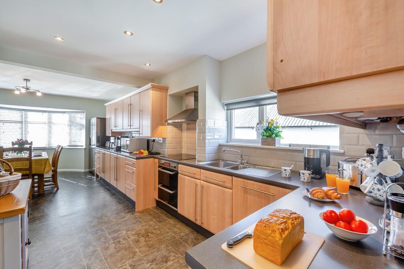 Oven, dishwasher, high chair, cookware/dishes/utensils