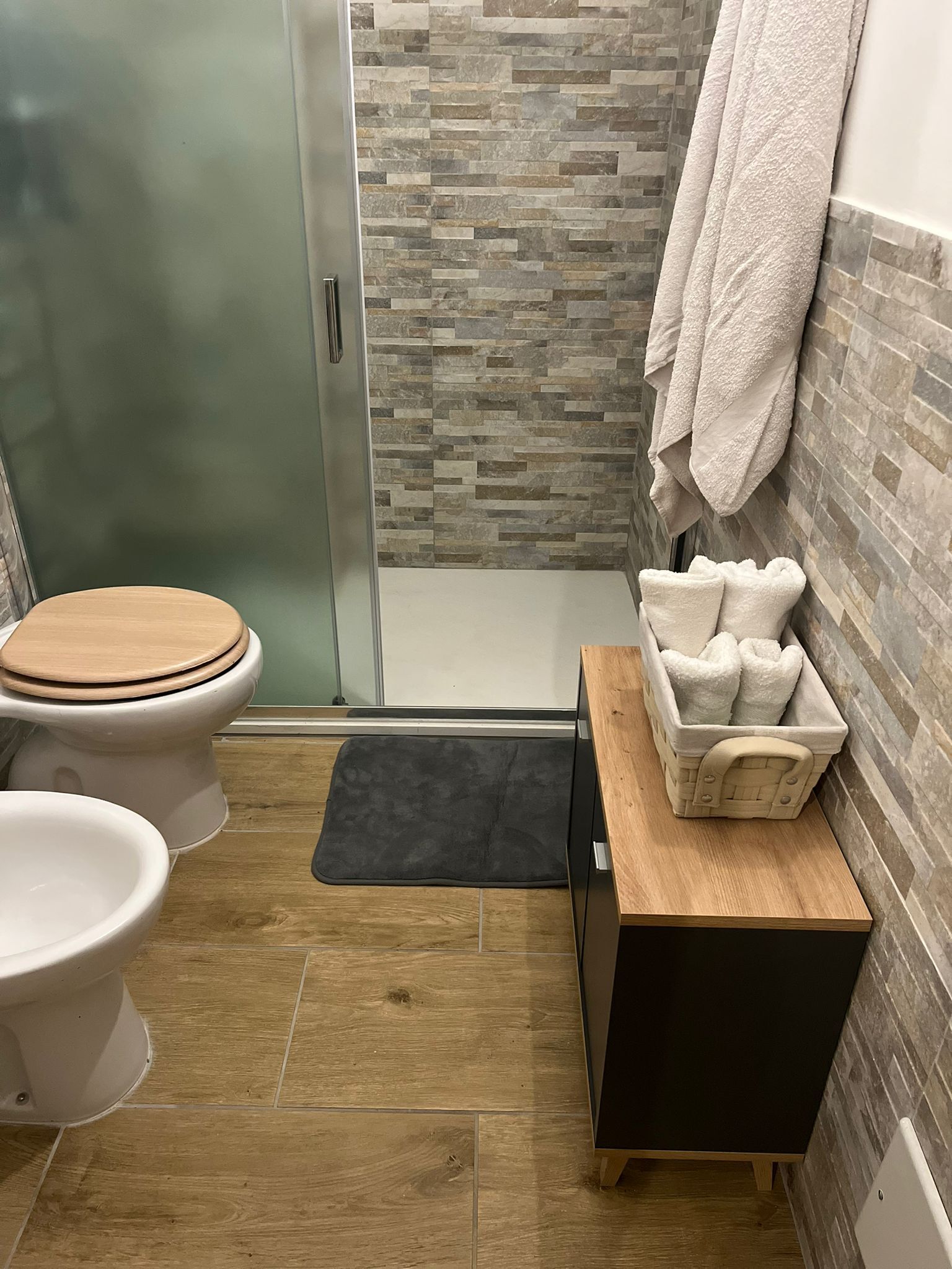 Hair dryer, bidet, towels, soap
