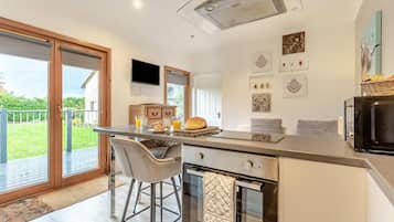 Microwave, oven, high chair, cookware/dishes/utensils