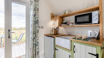 Microwave, oven, cookware/dishes/utensils