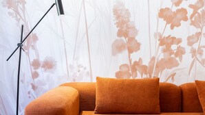 A modern living room with a sofa and a floor lamp. - Vigna Nuova District Apartment (Firenze)
