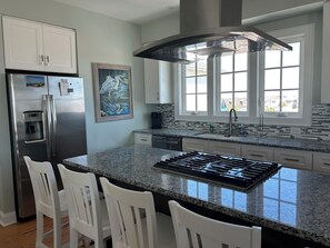 Fridge, microwave, oven, stovetop - Captains Choice ,is a  beachfront 5 bdrm coastal vacation home right in Atlantic Beach. Enjoy spacious living, a fully equipped kitchen, stunning ocean views, private pool & hot tub. Walk to food, drinks & music. Perfect for families. (Atlantic Beach)