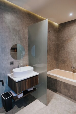 Deluxe Double Room, Pool View | Bathroom | Hair dryer, towels, soap, shampoo
