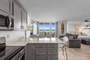 Fridge, microwave, oven, stovetop - Beachfront Estero Beach & Tennis Club 102B—Sunset Gulf Water Views, heated resort Pool, Pickleball & Tennis, 2 Bikes + beach Gear. 6-7 night stays (Fort Myers Beach)