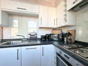 Apartamento premium, suíte, vista para a cidade (Family) | Cozinha privada