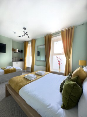 Family Apartment, Ensuite, City View | Desk, laptop workspace, iron/ironing board, free WiFi