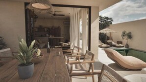Una sala de estar moderna con una mesa de comedor de madera, asientos cómodos, un ventanal con cortinas y vistas al exterior.