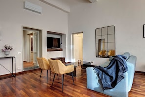 Apartment | Living area | 30-inch flat-screen TV with satellite channels - Pergola Apartment by Mamo Florence (Florence)
